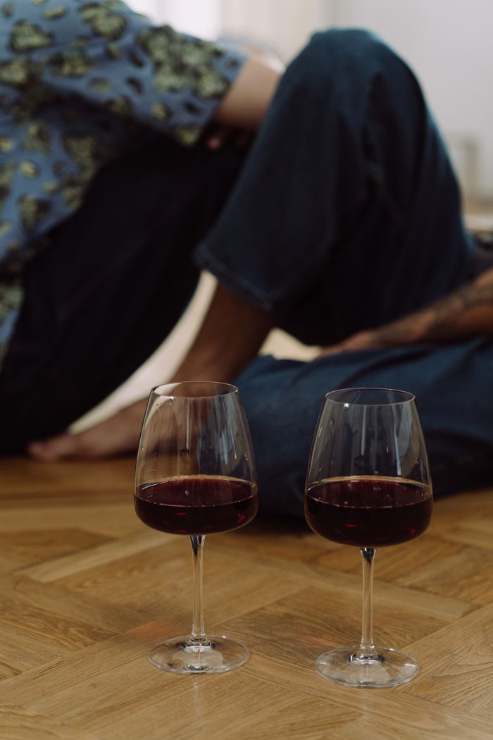 Cozy night in with red wine, perfect for intimate gatherings.